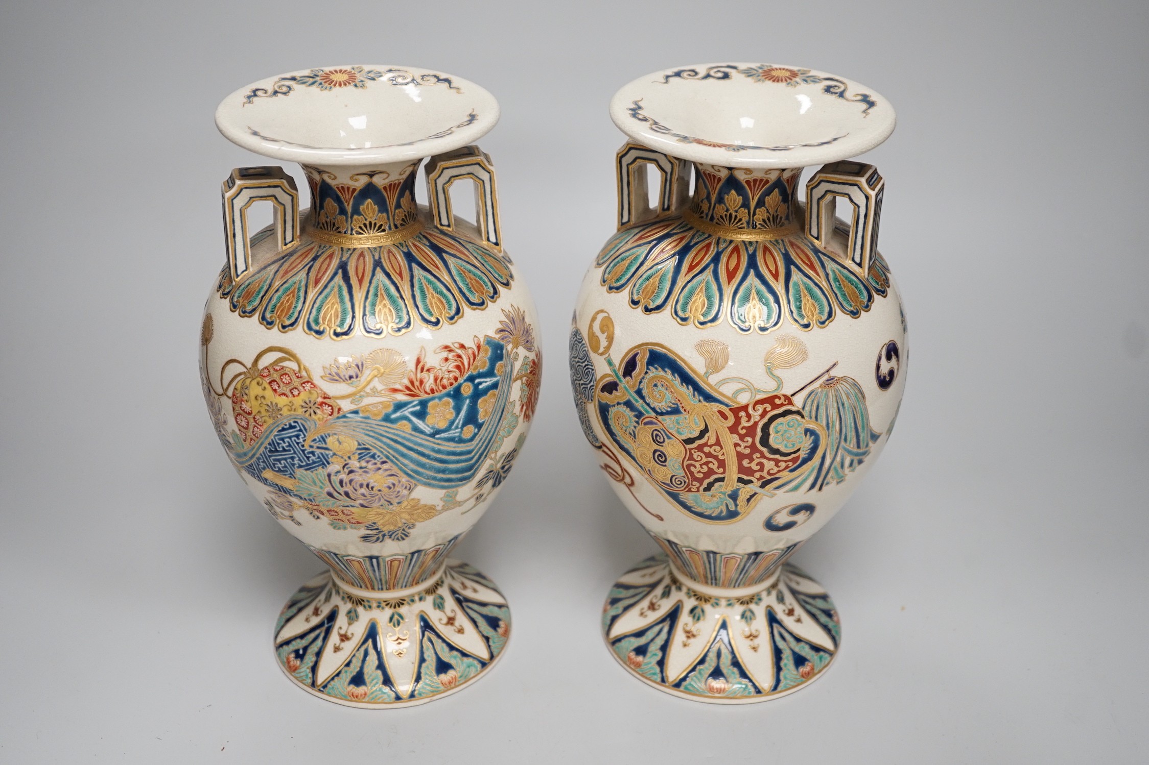 A pair of Japanese Satsuma gosu blue vases, Meiji period, signed to base. 24cm